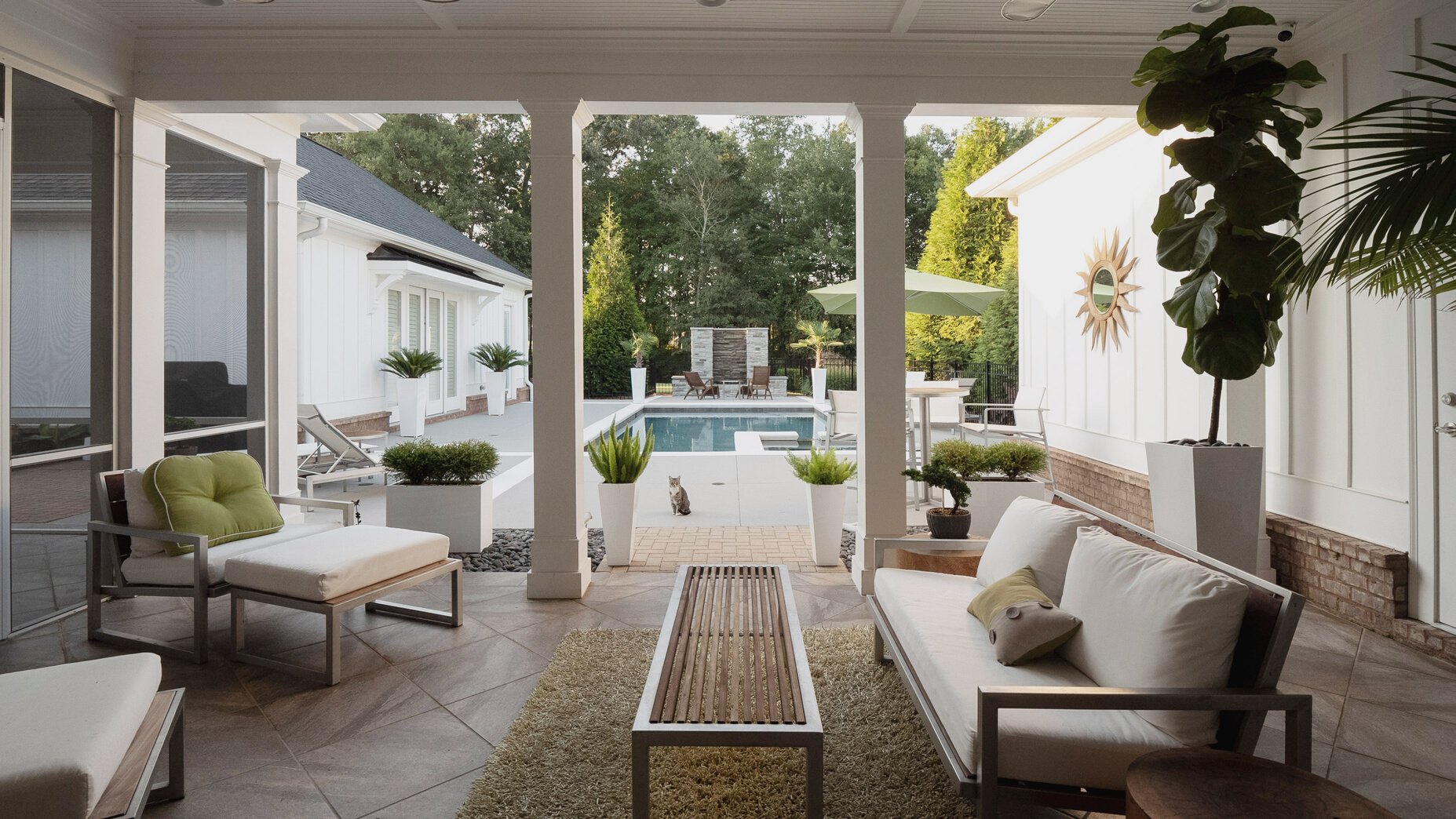 Modern patio overlooking pool.